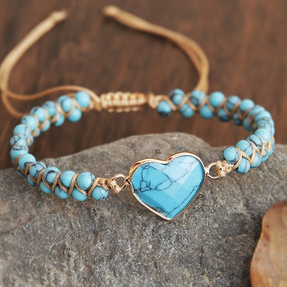 Redbird: Golden heart bracelet