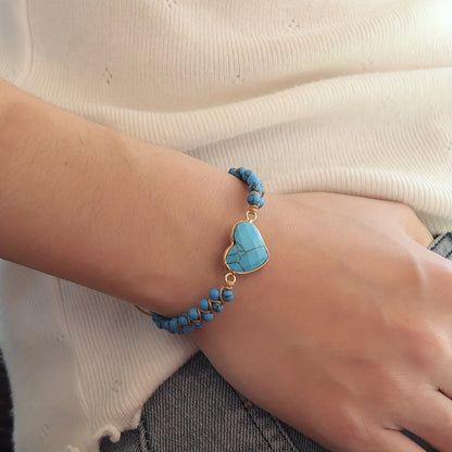 Redbird: Golden heart bracelet